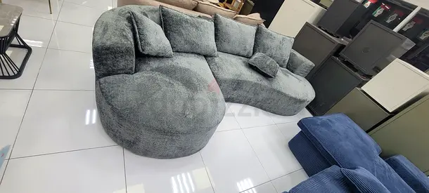 Cozy and Chic Curved Sofa in Soft Grey Fabric