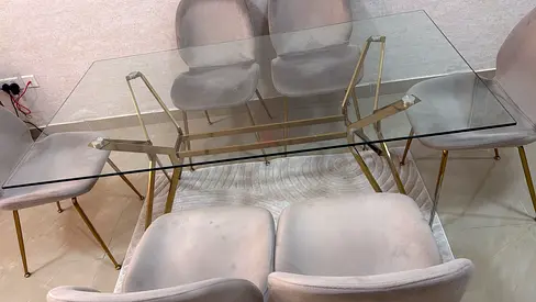 Glass Table with Stylish Chairs.
