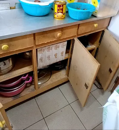 Kitchen cabinets with Aluminium sheet top.