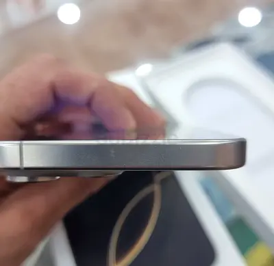 Sleek Apple iPhone in Excellent Condition with an original Apple water-resistant replacement screen.