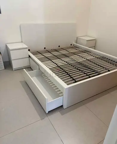 IKEA malam king‑size bed (180 × 200 cm) with 2 storage drawers underneath and an IKEA mattress