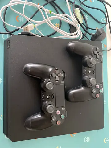 PlayStation for sale (ps4 Sony) it comes with a  2controller and charging cable and hdmi cord