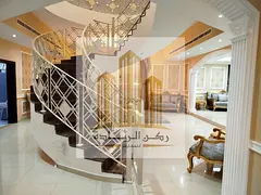 Two-story villa for sale in Al Rahmaniya 10, Sharjah.