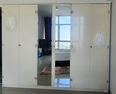 Elegant Mirrored Wardrobe with Ample Storage