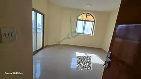 For rent in Ajman - Al Nuaimiya 1, a one-bedroom apartment in a strategic location, very close to th