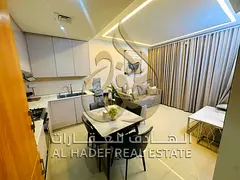 For annual rent in Sharjah, Al Majaz 2 area: a 3-bedroom apartment with a living room, central air c