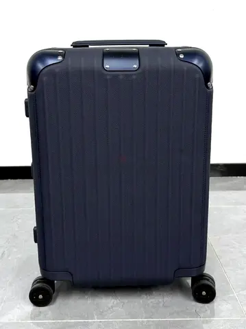 Rimowa blue suitcase