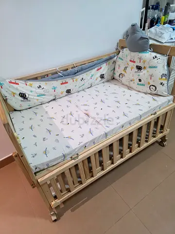 Gently Used Wooden Baby Crib with Mattress and Bedding