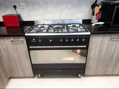 Smeg brand top gas oven electric stove 90x60cm.