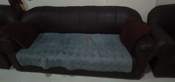 Comfortable Brown Leather Sofa with Cushions