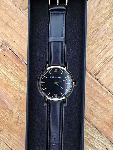 BLACK AND GOLD WATCH