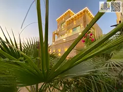 Luxury villa for sale in Al Zahia area, including registration and full ownership fees