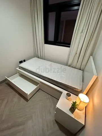 Cozy White Bed with Storage Drawers