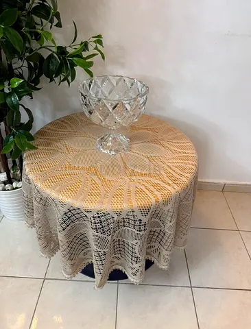 Elegant Round Table with Lace Tablecloth