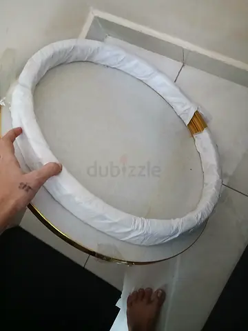 Elegant Round Coffee Table with Gold Trim