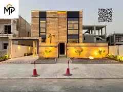 A very luxurious modern villa with a full stone facade and very luxurious interior decor with very h