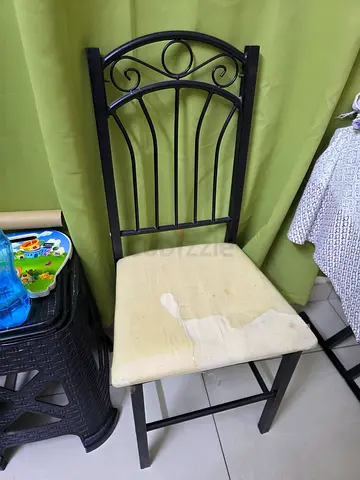 Used Metal Chair with Worn Cushion