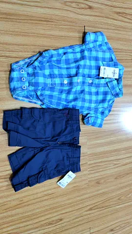 Brand new Oshkosh baby clothes - romper and short (6 to 9 months old baby)