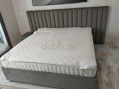 Elegant Grey Bed with Modern Design