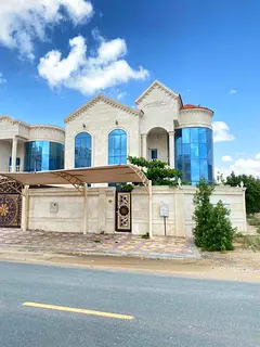 Villa for rent in Al Mowaihat, 1 corner, 5 master bedrooms, sitting room, hall, kitchen, and maid’