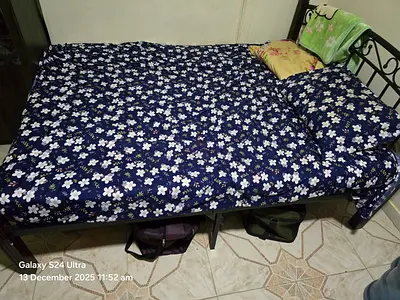 Comfortable Bed with Floral Bedding