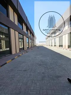 A prime showroom for rent in Al Jurf Industrial Area 1, Ajman, with a practical layout, mezzanine, a
