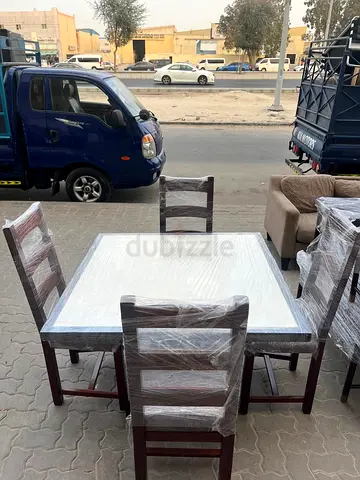 Table and chairs new