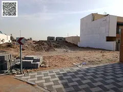 For sale: two adjacent townhouses in Al Zahia – Ajman. Area per unit: 160 m² (1,722 sq ft). Build