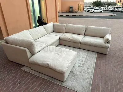 Looks great Condition Home Center Swin feather filled U Shape Sofa Beige
