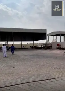 For sale in Sharjah, Al Sajaa area: A plot of land measuring 14,176 sq ft. Consisting of two commerc