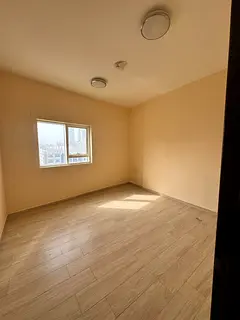 **Two-bedroom apartment with a living room – Second occupant in Al Qasimia Al-Nad – Free parking