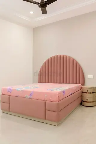 Stylish Pink Bed with Elegant Headboard
