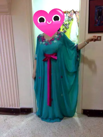 Handmade Elegant Turquoise Kaftan with Floral Embroidery “designed by Asmaa Bani Issa ”