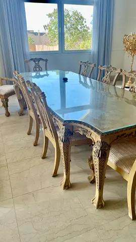 Elegant Dining Table with Ornate Chairs + chest drawers