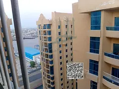 For sale: Two-bedroom apartment with a living room, 1800 sq. ft., in Al Khawr Towers, Ajman, with an