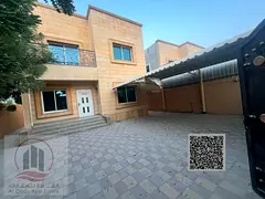 Villa for sale in Ajman, Al Muwaihat area. 5 master bedrooms, majlis, living room, and maid's ro