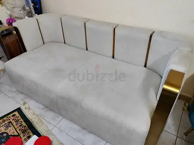 Stylish Modern Sofa with Gold Accents