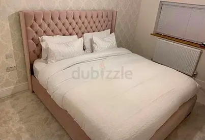 Elegant King Size Bed with Plush Headboard