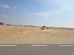 Two adjacent residential plots for sale in Sharjah, Basateen Al Zubair area.