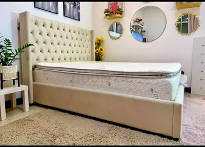 Elegant Queen Size Bed with Plush Headboard