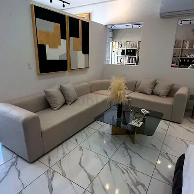 Modern L-Shaped Sofa Set with Glass Coffee Table