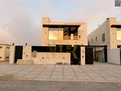 A luxurious villa with stunning architectural design, located opposite Ajman Academy and next to a m