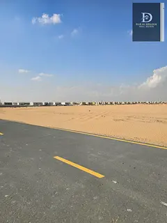 For Sale in Sharjah Rawdat Al Qurt Area Residential Investment Land Near Khor Fakkan Road Freehold f
