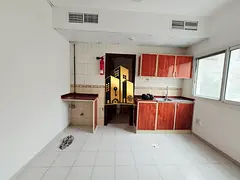 CLOSE TO MUWAILEH BUS STATION CENTRAL AC STUDIO READY TO MOVE MAINTENANCE FREE WELL DESIGN FREE SAND