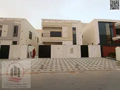 Villa for sale in Ajman, Al Bahia area. 5 bedrooms, living room, and majlis. Registration fees inclu