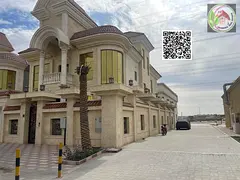 A luxurious villa located in the Al Yasmin area, boasting a prime location and a modern design that