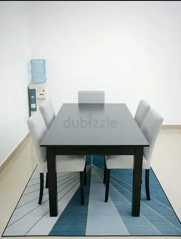 Stylish Dining Table with Modern Chairs