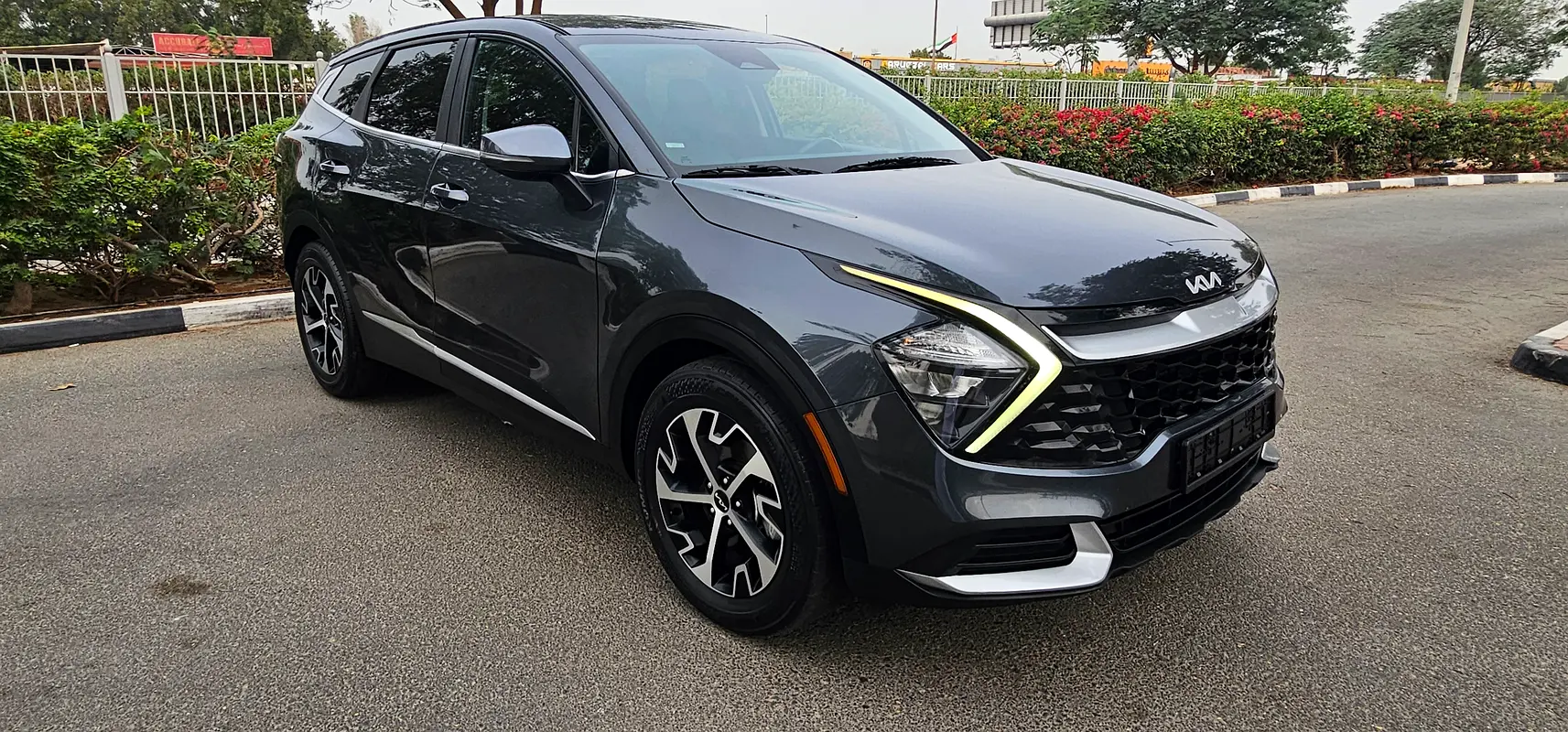 Kia Sportage 2023 — photo 1 of 15