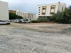 Land for sale in Al-Ramaqiyah, area 19,375 sq ft, divided into two plots, each plot is 900 sq ft.