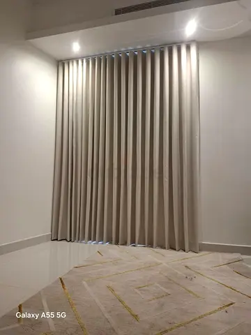 Elegant Neutral Area Rug and Chic Curtains Set